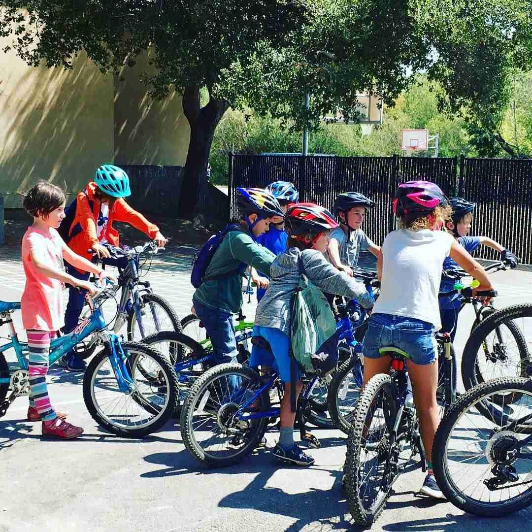 RVC students on bicycles for after-school mountain biking